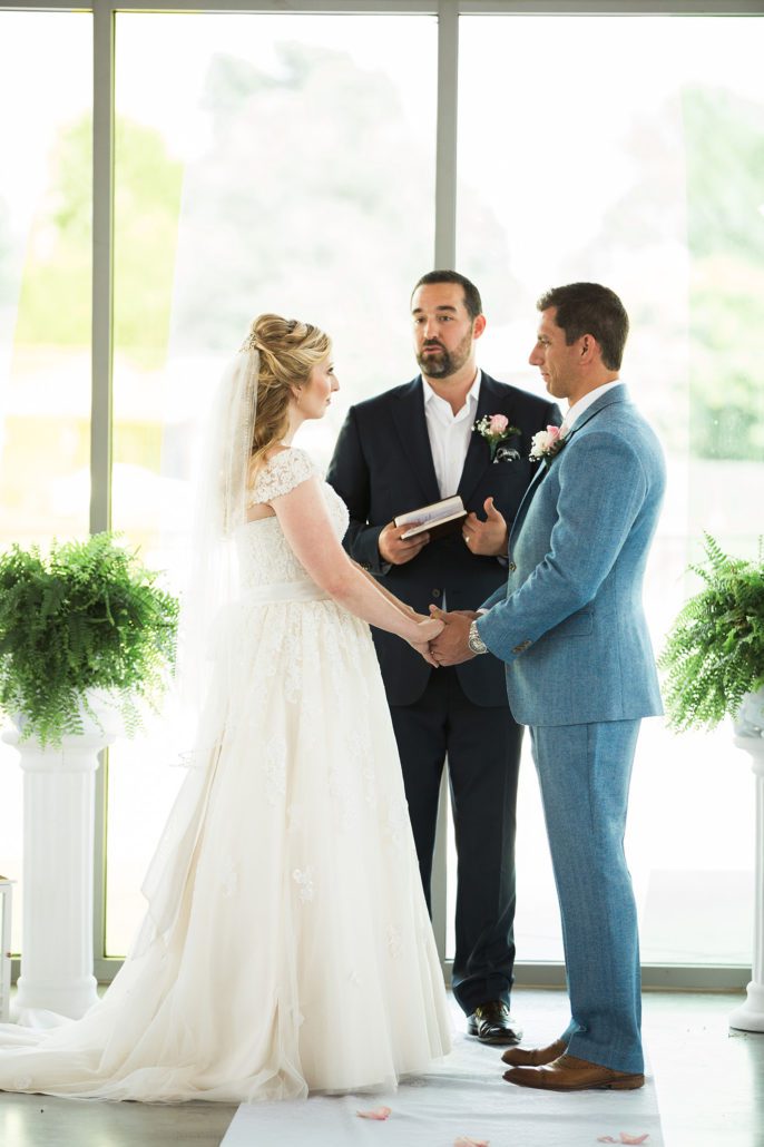 groom and bride exchange vows